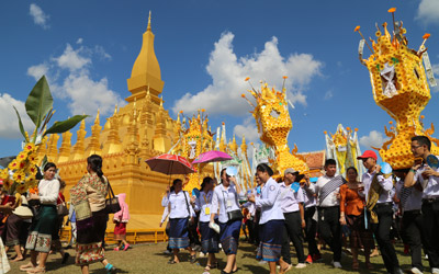 Stunning Wax Castle Procession Reflects Rich Lao Culture