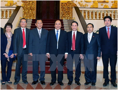 Vietnam’s PM Asks Lao, Vietnamese News Agencies to Foster Links