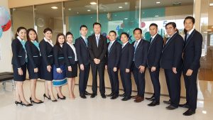 RHB Bank Lao staff pose at opening ceremony of Dongdok Branch