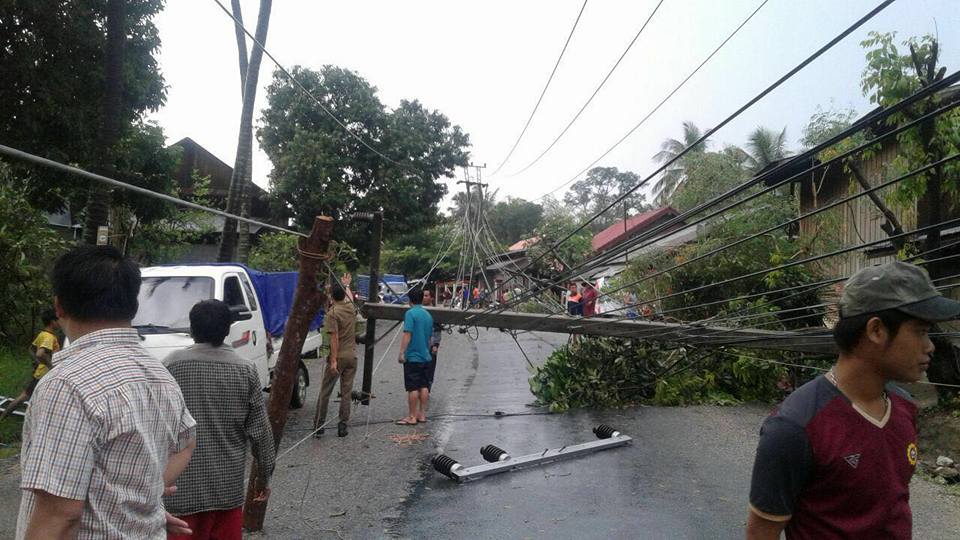 Construction materials fall on a utility pole