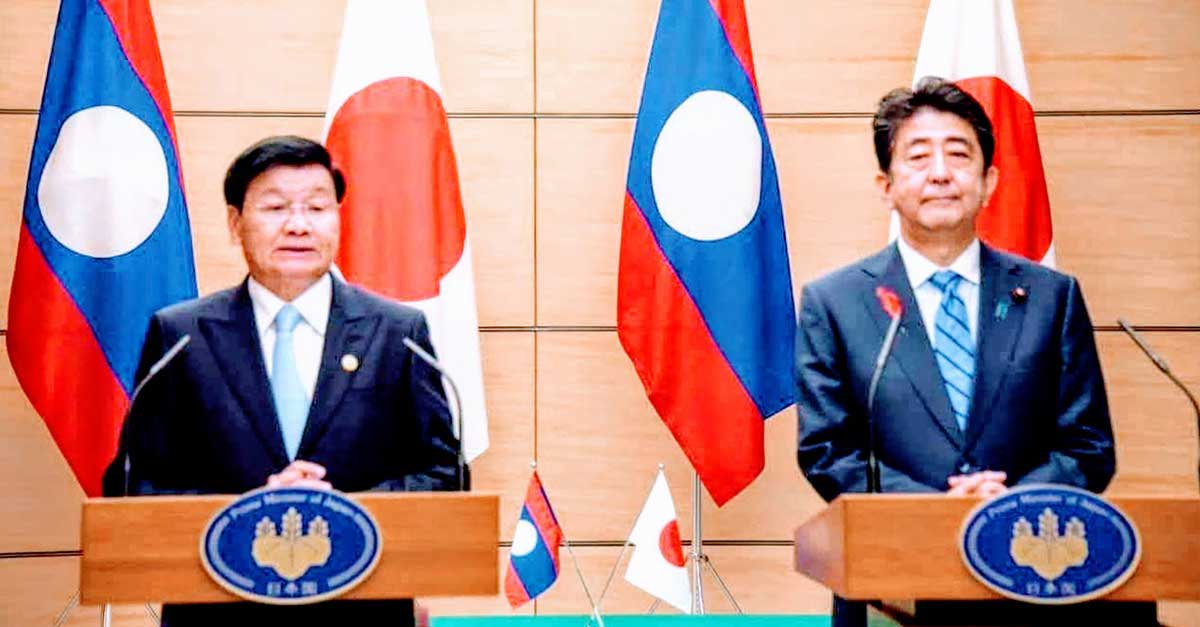 PM Thongloun (left) & PM Abe