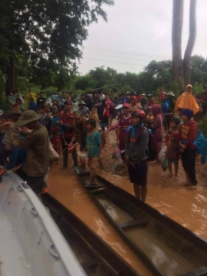 Villager being evacuated in Attapeu