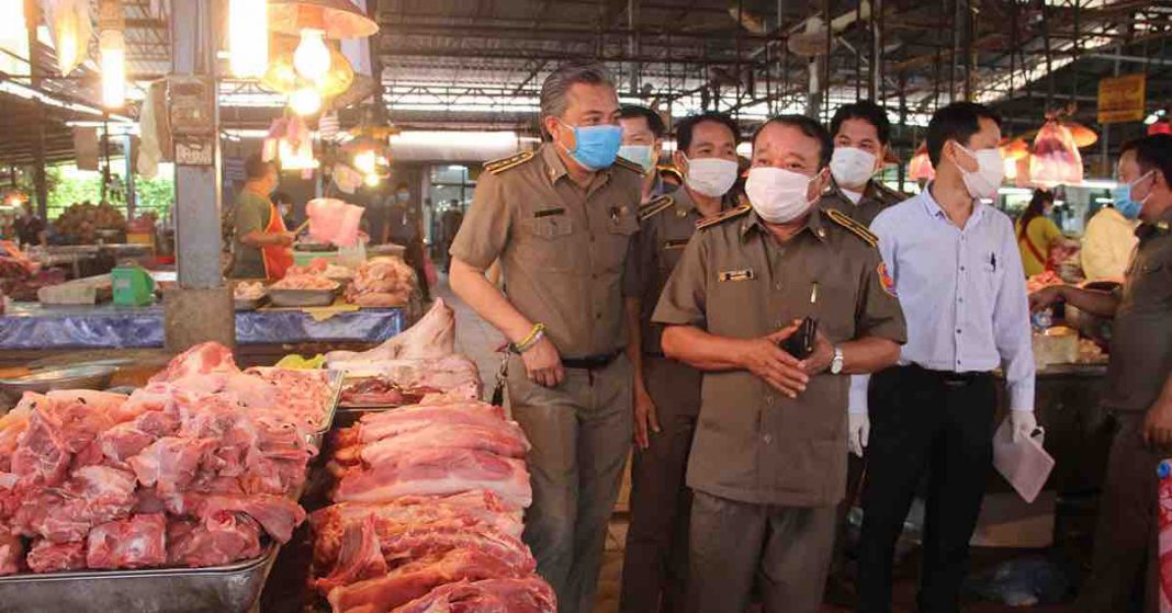 Vientiane officials patrol wet markets to stop price gouging