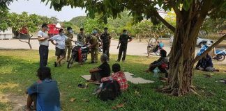 Police Assist Group of Homeless Laborers