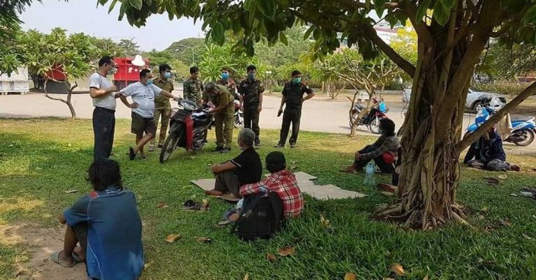 Police Assist Group of Homeless Laborers