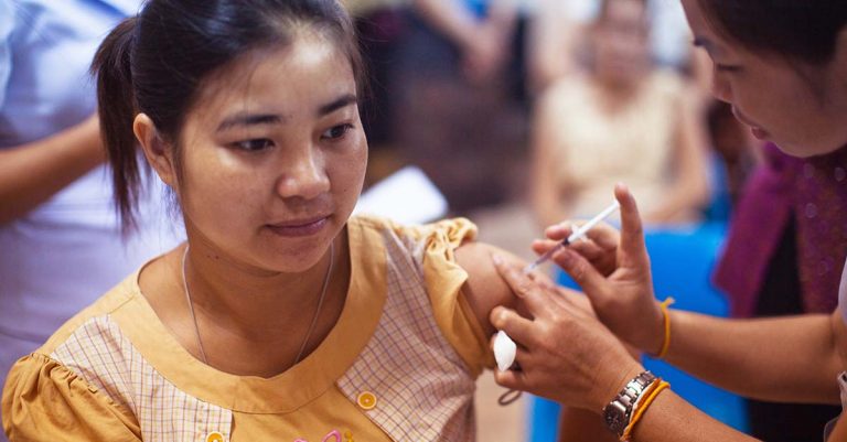 Woman receiving a vaccine at the Mother and Child Hospital in Vientiane, Laos