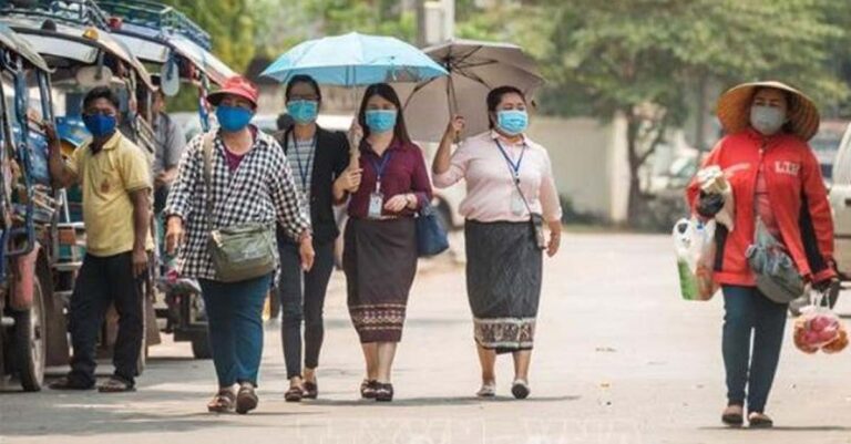 Lao People in Face Masks to Prevent Covid-19 in Laos