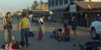 Mr. Khamla Phonsinan gives CPR at the scene of an accident in Vientiane