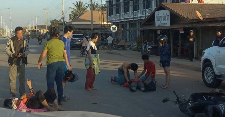Mr. Khamla Phonsinan gives CPR at the scene of an accident in Vientiane