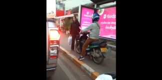 Foreigner stops traffic on footpath