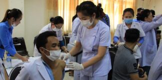 Laos begins vaccinations against Covid-19