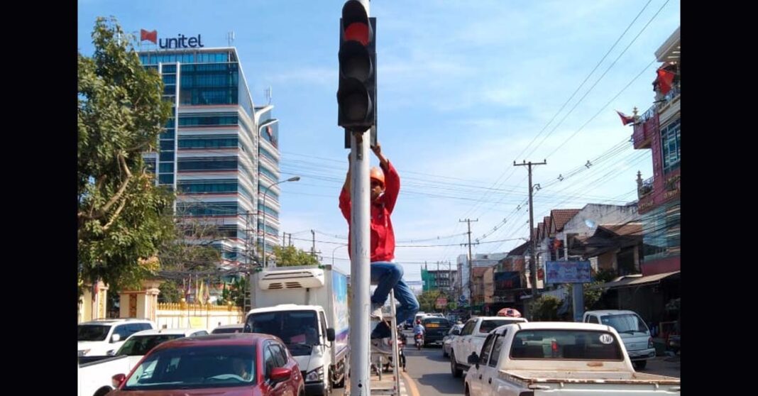 Repairing traffic lights in Vientiane Capital