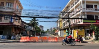 Barricades block a red zone in Vientiane Capital