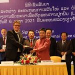 Mr. Savaythong Khounsavanh (in the red shirt) signed the partnership agreement with French Coffee Roaster Malongo (Photo: UNRCO Lao PDR)