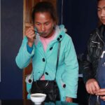Ms. Siathor Yialao in a testing coffee training organized by Vanmai Cooperative.  (Photo: UNODC Lao PDR)