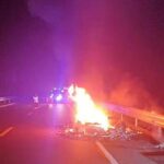 Remains of the vehicle on fire