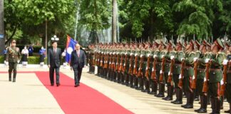 President Thongloun and President Nguyen walk side by side