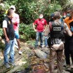 Thai police at the crime scene in Phuket (Photo: Achadthaya Chuenniran)