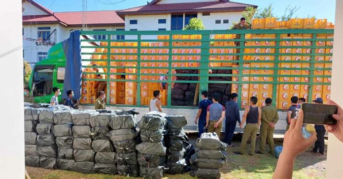 Truck carrying empty beer bottles filled with illicit drugs
