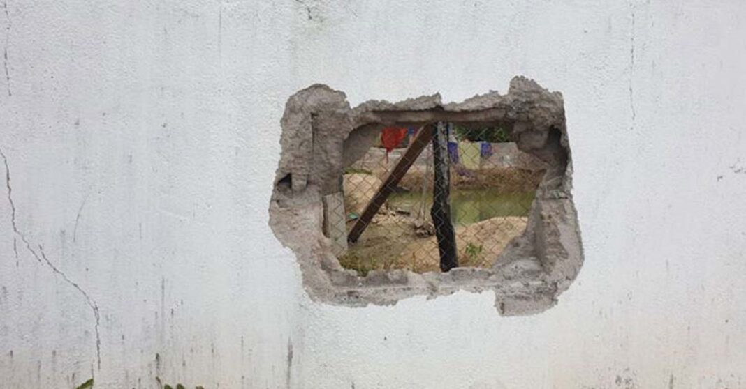 A hole broken through the brick wall of Stung Treng provincial prison (Photo: Khmer Times)