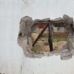 A hole broken through the brick wall of Stung Treng provincial prison (Photo: Khmer Times)