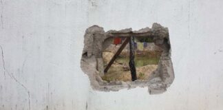 A hole broken through the brick wall of Stung Treng provincial prison (Photo: Khmer Times)