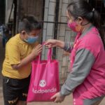 A child receives a foodpanda “Happiness Bag”