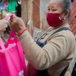 A “Happiness Bag” handed to a needy resident.
