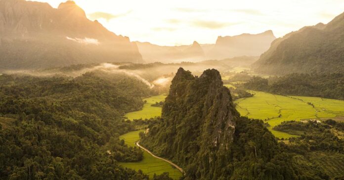 Laos to reopen to tourism under three-phase scheme.