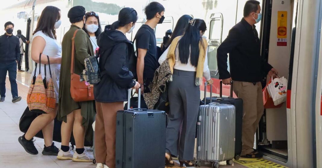 Passengers boarding the Laos-China Railway at Vientiane Station