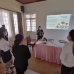 IMCT Trainer using group workshops as part of the training to Food & Beverage providers in Vientiane Capital