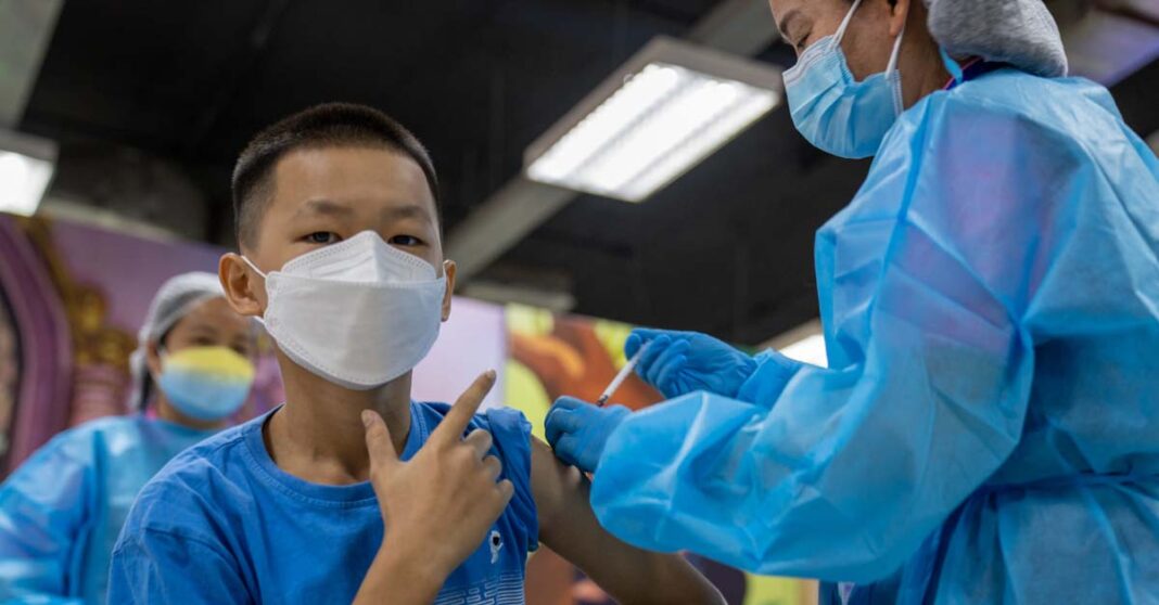 A child receives a Covid-19 vaccine