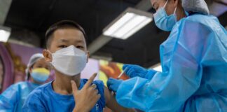 A child receives a Covid-19 vaccine