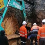 Rescue workers from Lane Xang Minerals help save trapped illegal miners