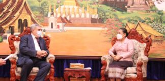 Russian Amabssador to Laos Vladimir A. Kalinin meets Tourism Minister Suanesavanh Vignaket