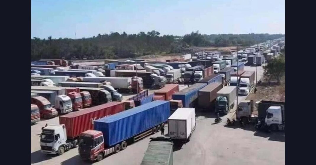 Trucks remain stranded at the Boten border with China in Luang Namtha