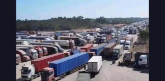 Trucks remain stranded at the Boten border with China in Luang Namtha