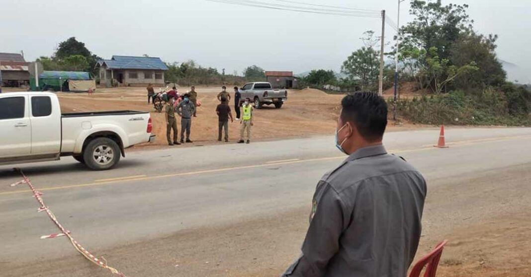 A police checkpoint in Vilabouly district