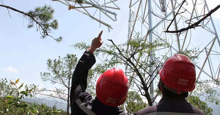 Chinese engineers observe work in Yunnan Province.