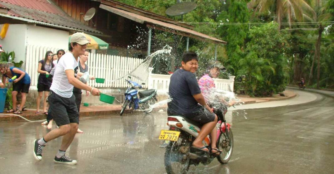 Making a splash during Lao New Year in Luang Prabang.