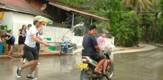 Making a splash during Lao New Year in Luang Prabang.