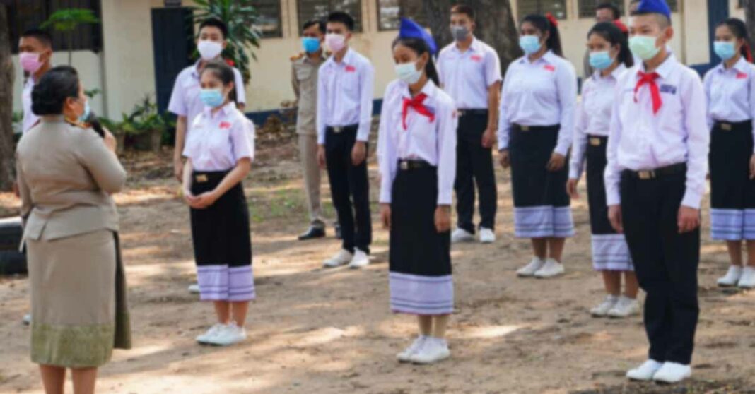 Teacher and students practise social distancing (photo: UNICEF Laos).