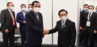 Cambodian Prime Minister Hun Sen meets Lao Prime Minister Phankham Viphavanh in Japan