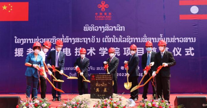 Lao Minister of Technology and Communications, Boviengkham Vongdara, and Chinese Ambassador to Laos, Jiang Zaidong, attend the groundbreaking the ceremony for the educational facility.