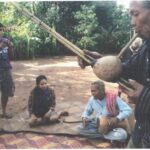 A man holding a Khaen and Phloy mouth organ in Cambodia (Photo: Culture in Crisis)