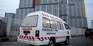 Ambulance in Indonesia where three children have died of liver disease.