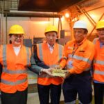 Some engineers discover gold pour.