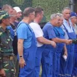 Lao military officials greet the Belarus technical team.
