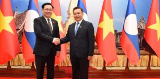 President of the Lao National Assembly, Dr. Xaysomphone Phomvihane with Chairman of the Vietnamese National Assembly Vuong Dinh Hue