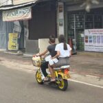 Residents scour the city for petrol stations to fill up empty milk bottles.